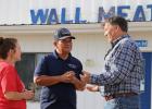 U.S. Sen. Mike Rounds, at right, met with Wall Meat Processing representatives during a recent visit to the plant. Rounds supports expansion of regional meat packing plants in the state. Courtesy Bart Pfankuch/South Dakota News Watch