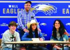 Tearra Merrill, a senior at Wall High School, signed a letter of intent to rodeo for Casper College. Tearra is the daughter of Shawn Merrill and Leslie Merrill. Pictured: Cayne Merrill (brother), Chuck Deutscher (grandfather), Tearra Merrill, and Leslie Merrill (mother). Courtesy Photo