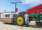 Dewey Brooks stopped at the co-op in Murdo to fill up his tractor and to answer questions from curious by-standers. Photo by Rylee Metzger