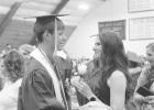 Tristen Host presents a flower to his mother, Ann Geisler. Tristen Host is the class Valedictorian and gave a speech. Photo by Mishayla Buchannan
