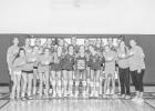 The Jones County volleyball team celebrates Peyton’s achievement. Photo by Barb Hockenbary Photography