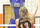 Kyla Sawvell (#20) ready to block the ball.