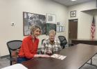 Kendall Nelson, director of the Wall Economic Development Corporation, and Wall Mayor Mary Williams review information regarding all the recent developments in Wall. Photo courtesy of Elizabeth Meighen