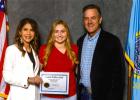 Kaycee Groves ... Faith High School’s top senior for the Class of 2022, pictured with Governor Noem(left) and Lieutenant Governor Larry Rhoden(right). Courtesy photo